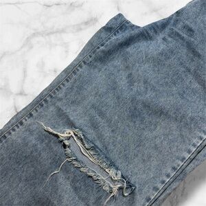 Distressed Blue Denim Jeans